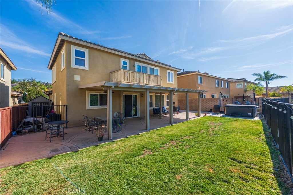 17073 Spring Canyon Place Riverside, CA 92503 - Photo 31 of 43 a view of a house with a yard porch and sitting area
