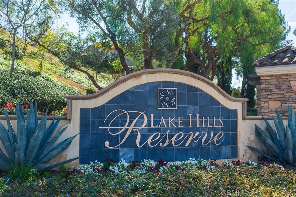 17073 Spring Canyon Place Riverside, CA 92503 - Photo 34 of 43 a front of a brick building with a sign broad