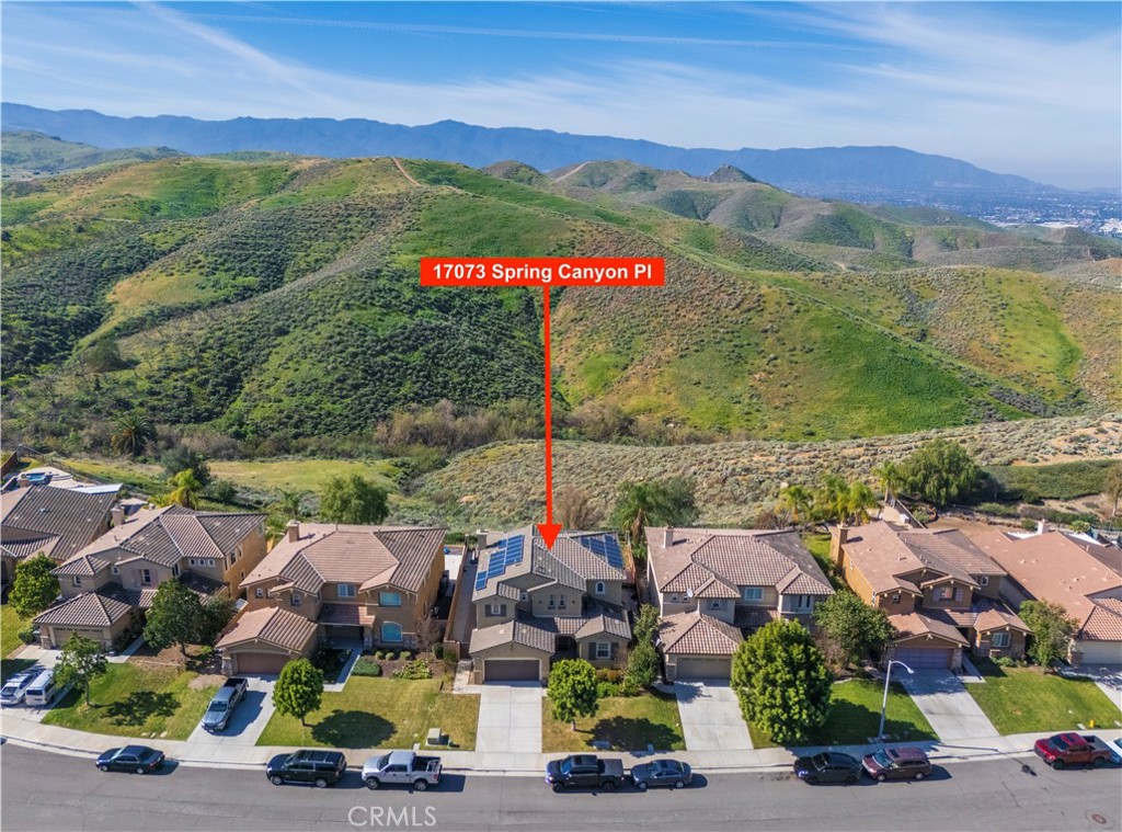 17073 Spring Canyon Place Riverside, CA 92503 - Photo 36 of 43 an aerial view of houses with a street