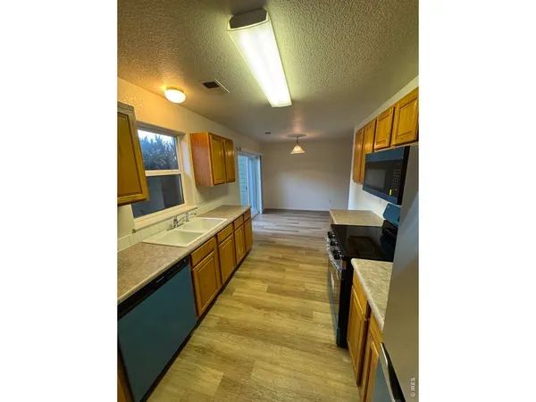 a large bathroom with a sink and mirror
