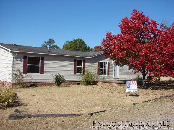272 Line Road Cameron, NC 28326 - Photo 1 of 25 a view of a house with a yard