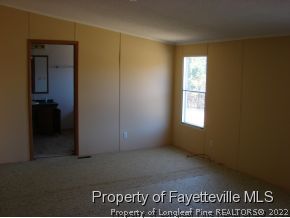 272 Line Road Cameron, NC 28326 - Photo 14 of 25 an empty room with window
