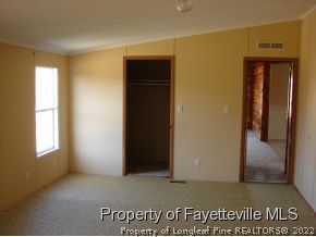 272 Line Road Cameron, NC 28326 - Photo 17 of 25 a view of an empty room and window