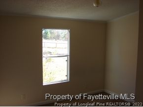 272 Line Road Cameron, NC 28326 - Photo 19 of 25 a view of an empty room and window
