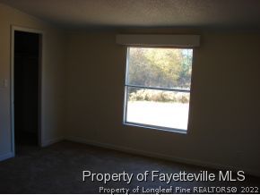 272 Line Road Cameron, NC 28326 - Photo 20 of 25 a view of a room that has a window in it