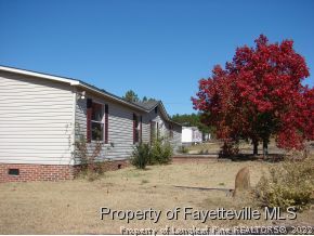 272 Line Road Cameron, NC 28326 - Photo 25 of 25 a view of a house with a yard