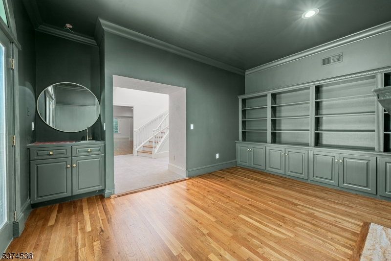 201 Dryden Road Bernardsville, NJ 07924 - Photo 17 of 48 a bedroom with a bed and cabinets