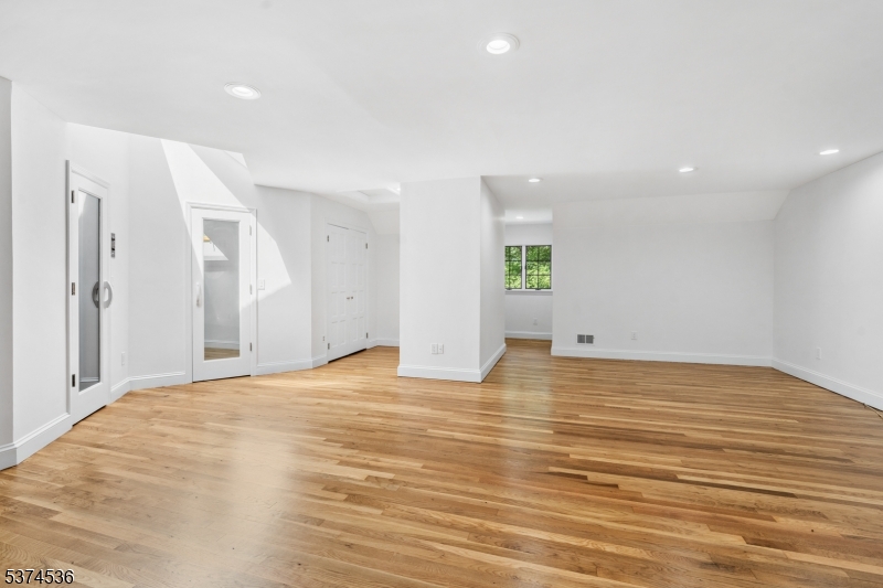 201 Dryden Road Bernardsville, NJ 07924 - Photo 20 of 48 a view of empty room with wooden floor