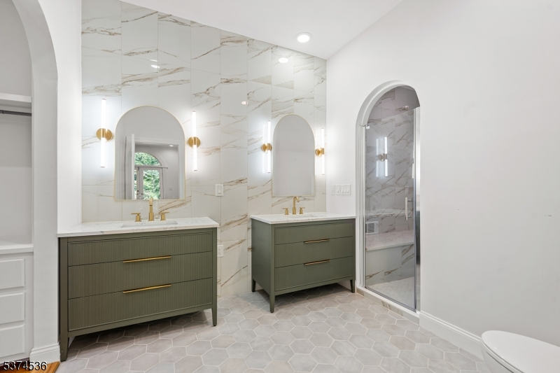 201 Dryden Road Bernardsville, NJ 07924 - Photo 21 of 48 a bathroom with a double vanity sink mirror and