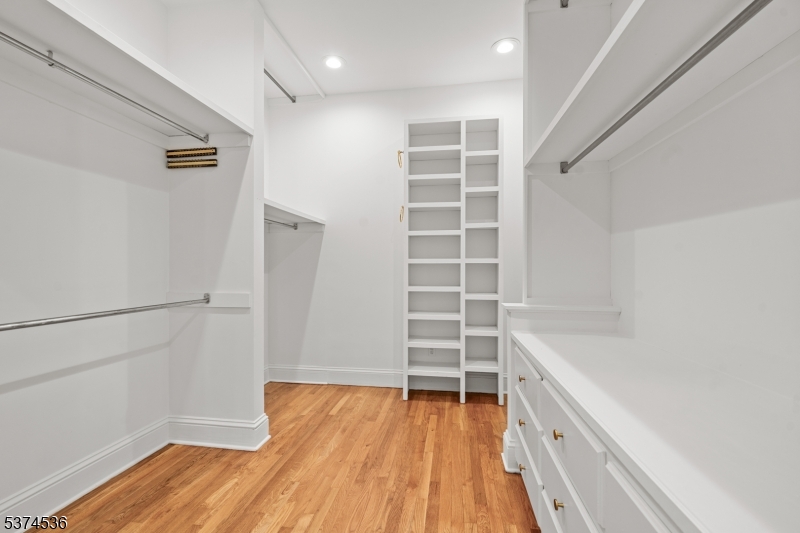 201 Dryden Road Bernardsville, NJ 07924 - Photo 23 of 48 a view of walk in closet with empty racks