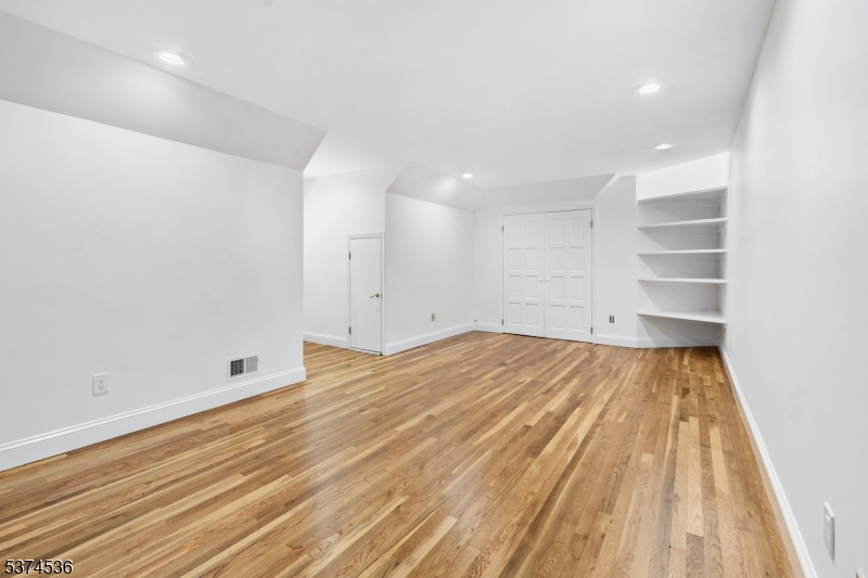 201 Dryden Road Bernardsville, NJ 07924 - Photo 24 of 48 a view of empty room with wooden floor