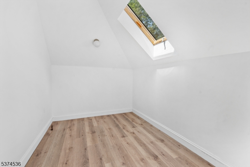 201 Dryden Road Bernardsville, NJ 07924 - Photo 27 of 48 a view of a small space with wooden floor and white walls