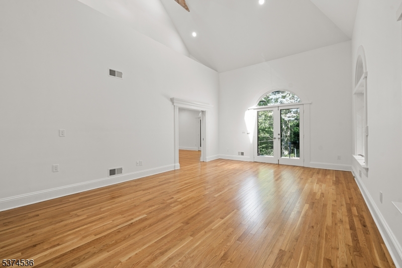 201 Dryden Road Bernardsville, NJ 07924 - Photo 7 of 48 wooden floor in an empty room with a window