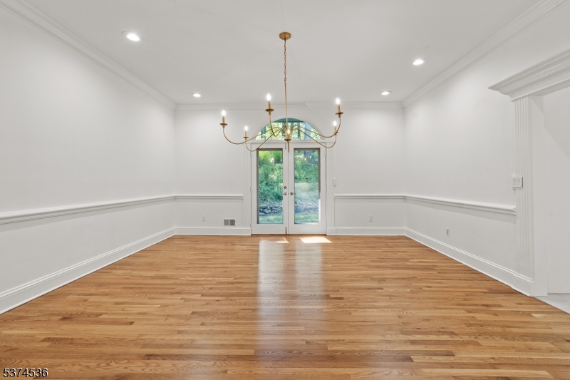 201 Dryden Road Bernardsville, NJ 07924 - Photo 9 of 48 a view of a room with wooden floor and white walls