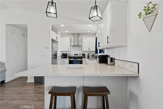 a bedroom with a bed and a table in it