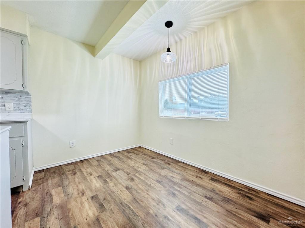 1620 West Samano Street Edinburg, TX 78539 - Photo 18 of 39 wooden floor in an empty room