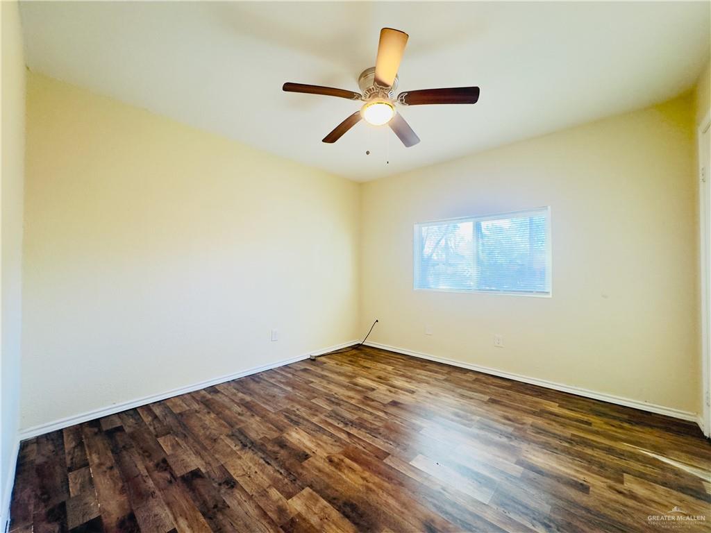 1620 West Samano Street Edinburg, TX 78539 - Photo 34 of 39 a view of empty room with wooden floor