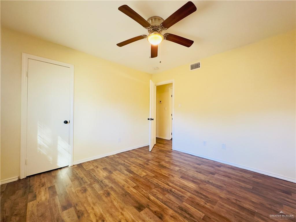 1620 West Samano Street Edinburg, TX 78539 - Photo 35 of 39 wooden floor in an empty room