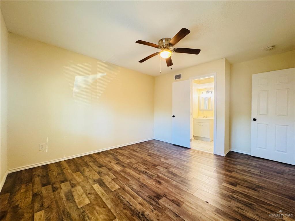 1620 West Samano Street Edinburg, TX 78539 - Photo 37 of 39 a view of empty room with wooden floor