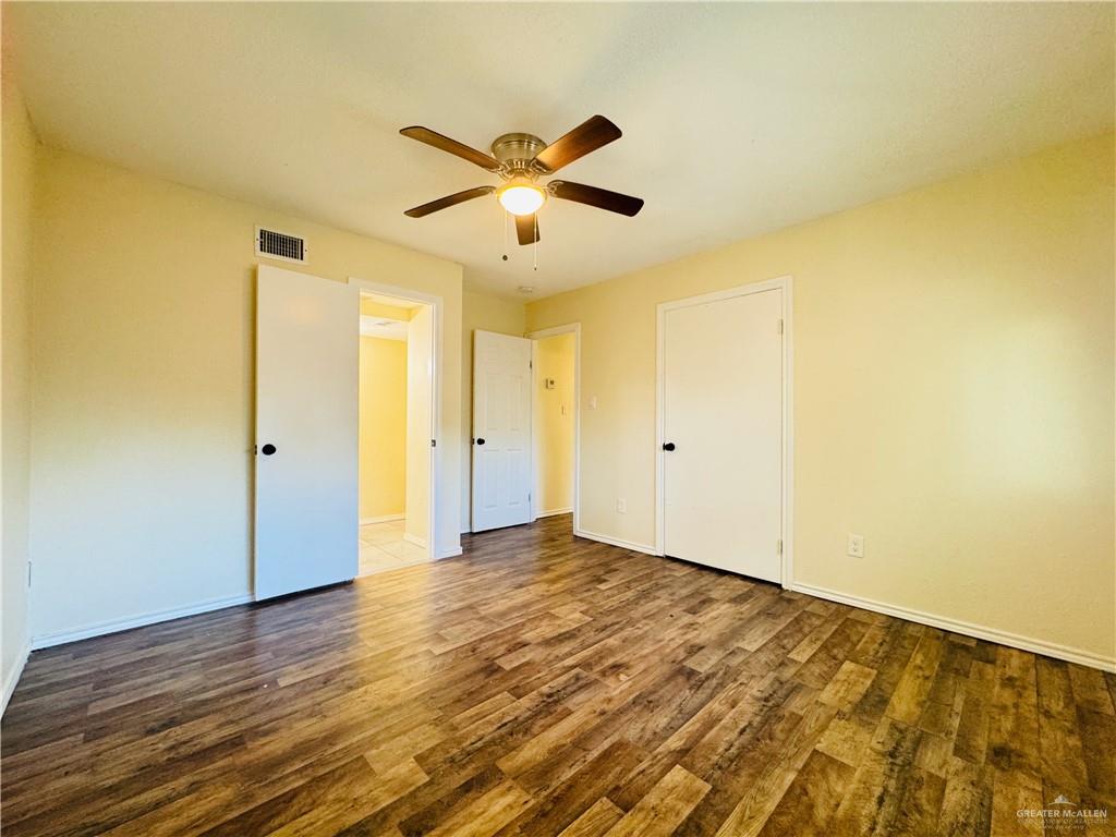 1620 West Samano Street Edinburg, TX 78539 - Photo 38 of 39 a view of empty room with wooden floor