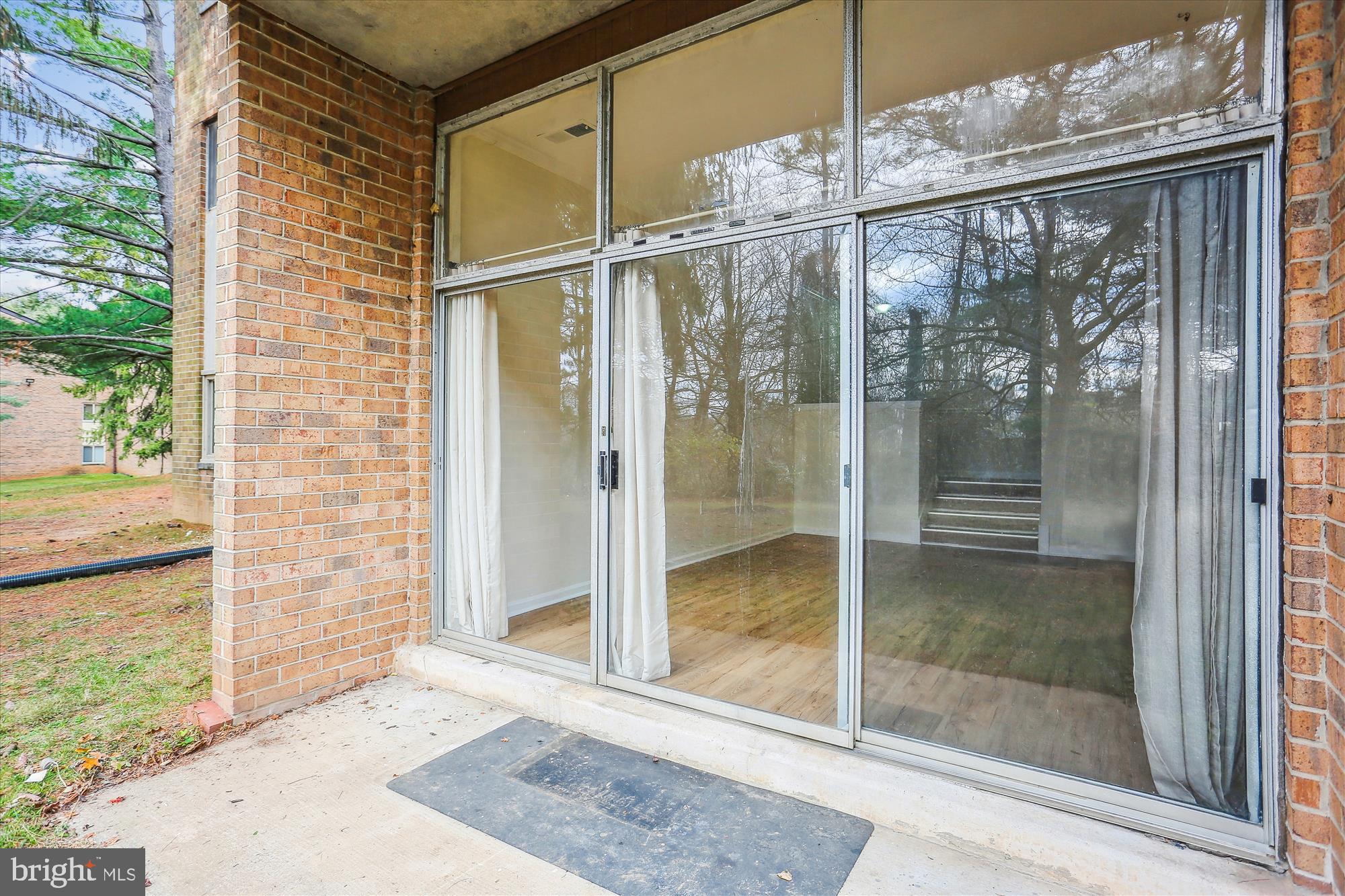 18612 Walkers Choice Road, Unit 1 Montgomery Village, MD 20886 - Photo 25 of 42 a glass door with glass door