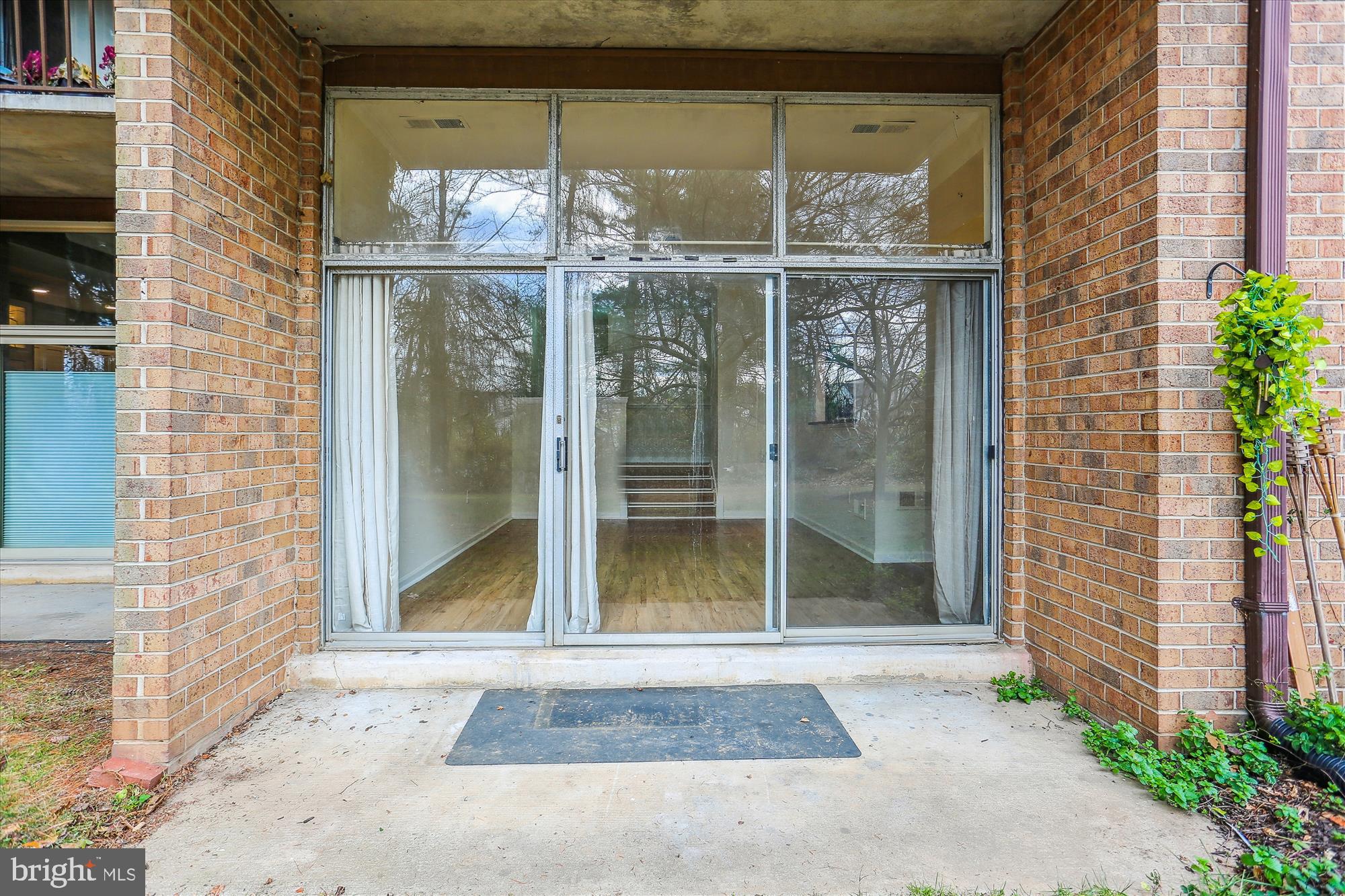 18612 Walkers Choice Road, Unit 1 Montgomery Village, MD 20886 - Photo 26 of 42 a glass door with glass door