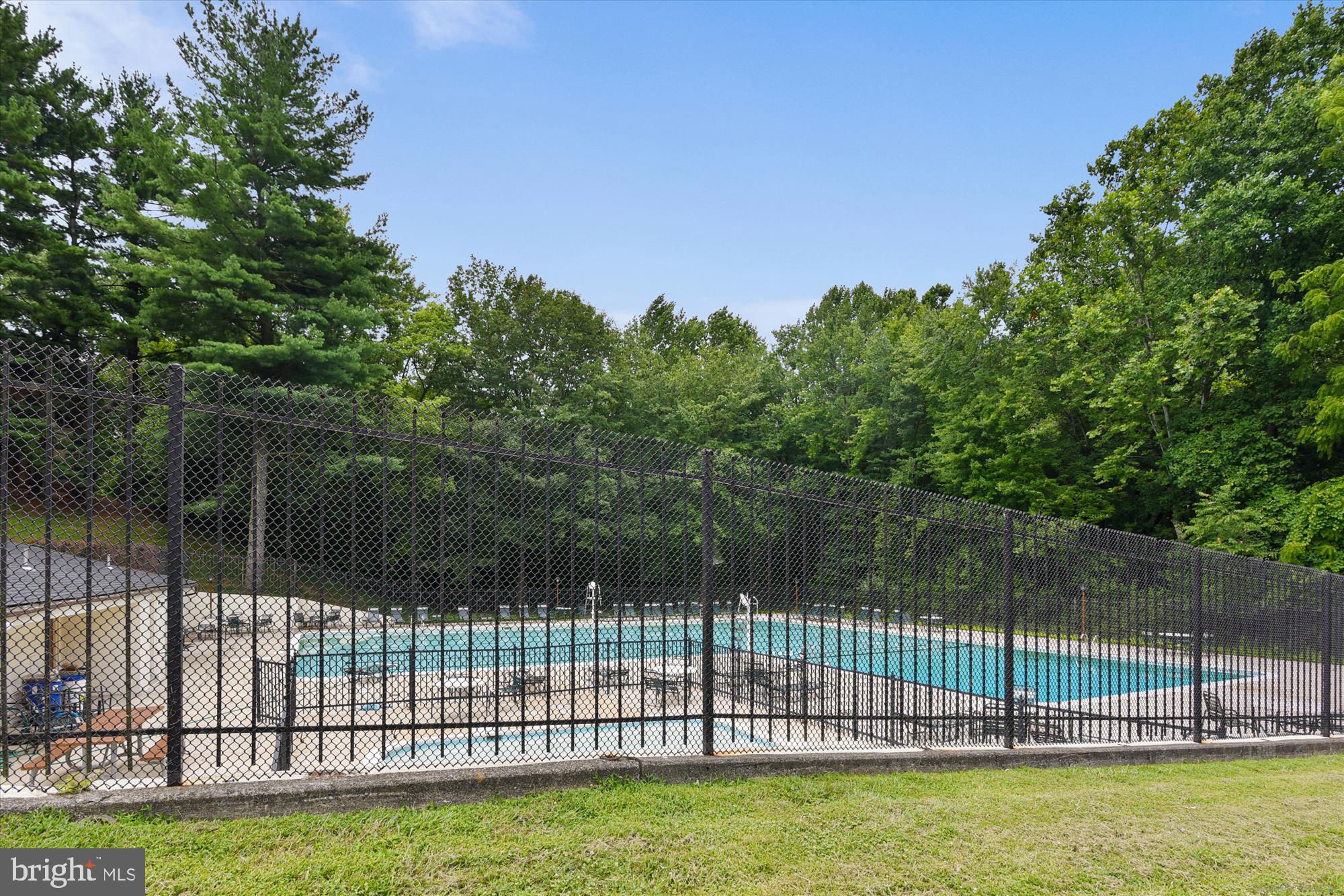 18612 Walkers Choice Road, Unit 1 Montgomery Village, MD 20886 - Photo 29 of 42 a view of a backyard with a small garden