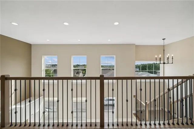 a view of a hallway with a window