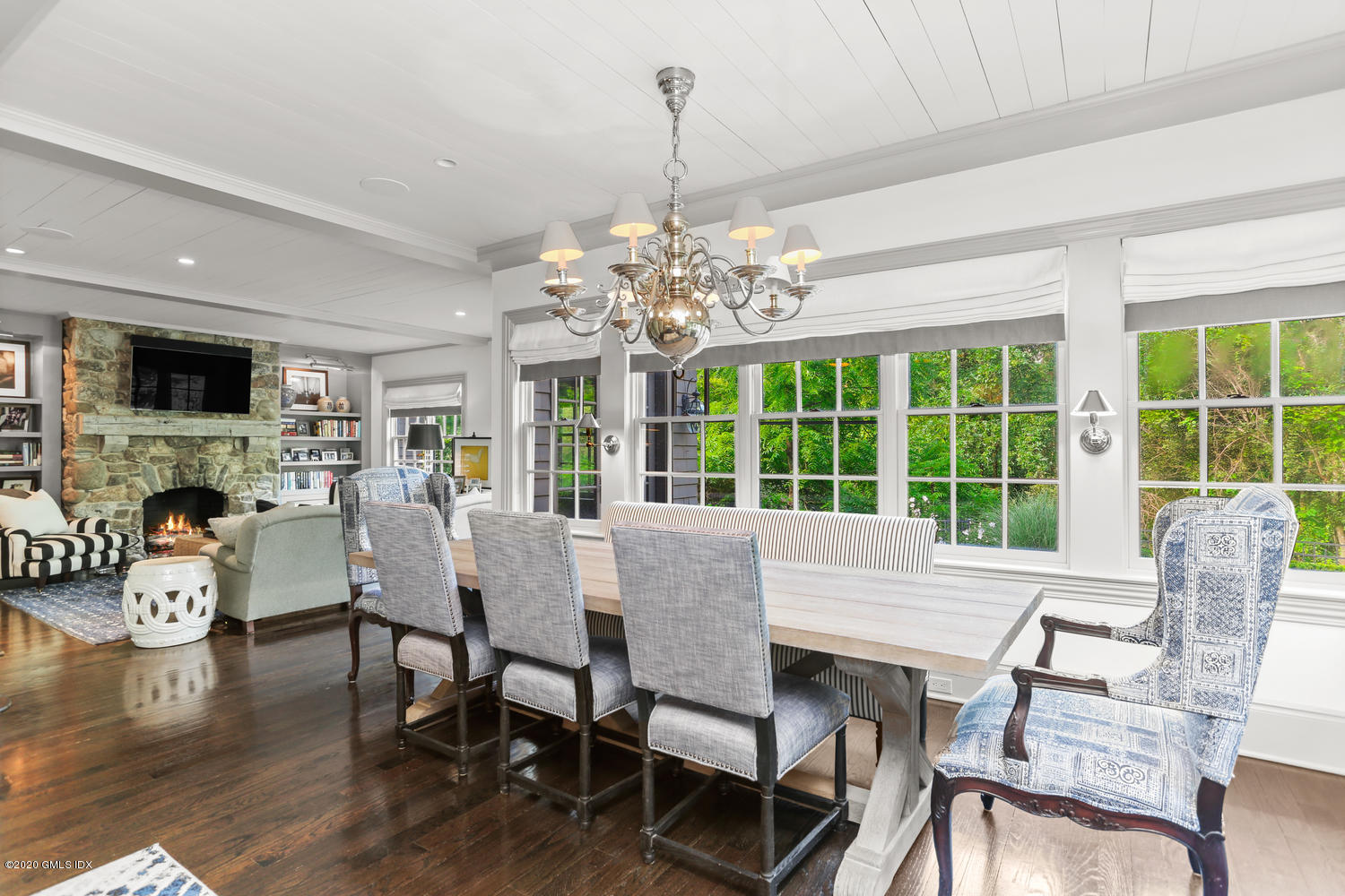 18 Chieftans Road Greenwich, CT 06831 - Photo 11 of 30 a view of a dining room with furniture window and wooden floor