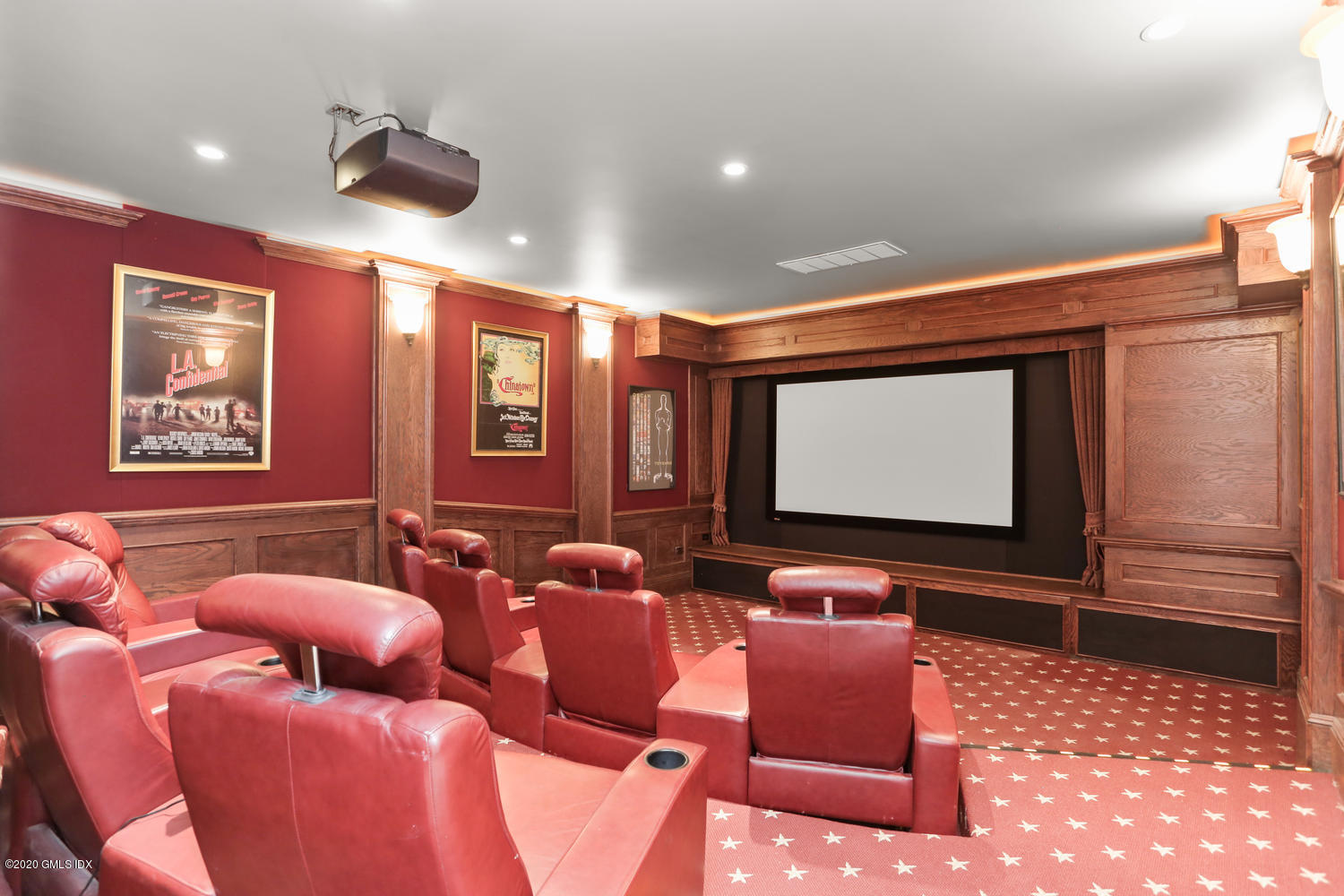 18 Chieftans Road Greenwich, CT 06831 - Photo 19 of 30 a projector room with furniture projector and screen