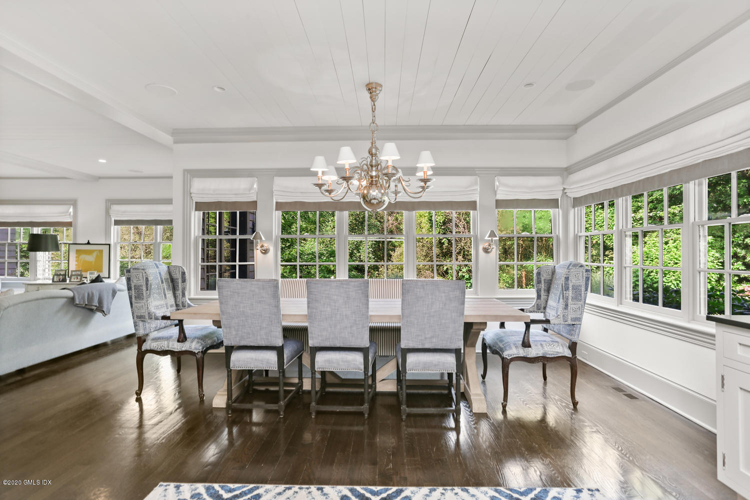 18 Chieftans Road Greenwich, CT 06831 - Photo 10 of 30 a view of a dining room with furniture window and wooden floor