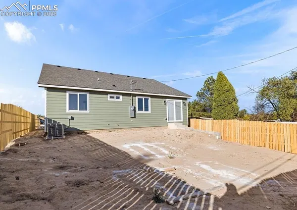a house view with a backyard space