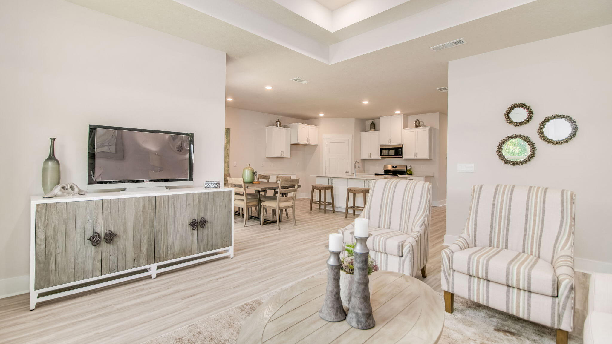 5841 Dove Nest Road Gulf Breeze, FL 32563 - Photo 11 of 30 a living room with furniture and a flat screen tv