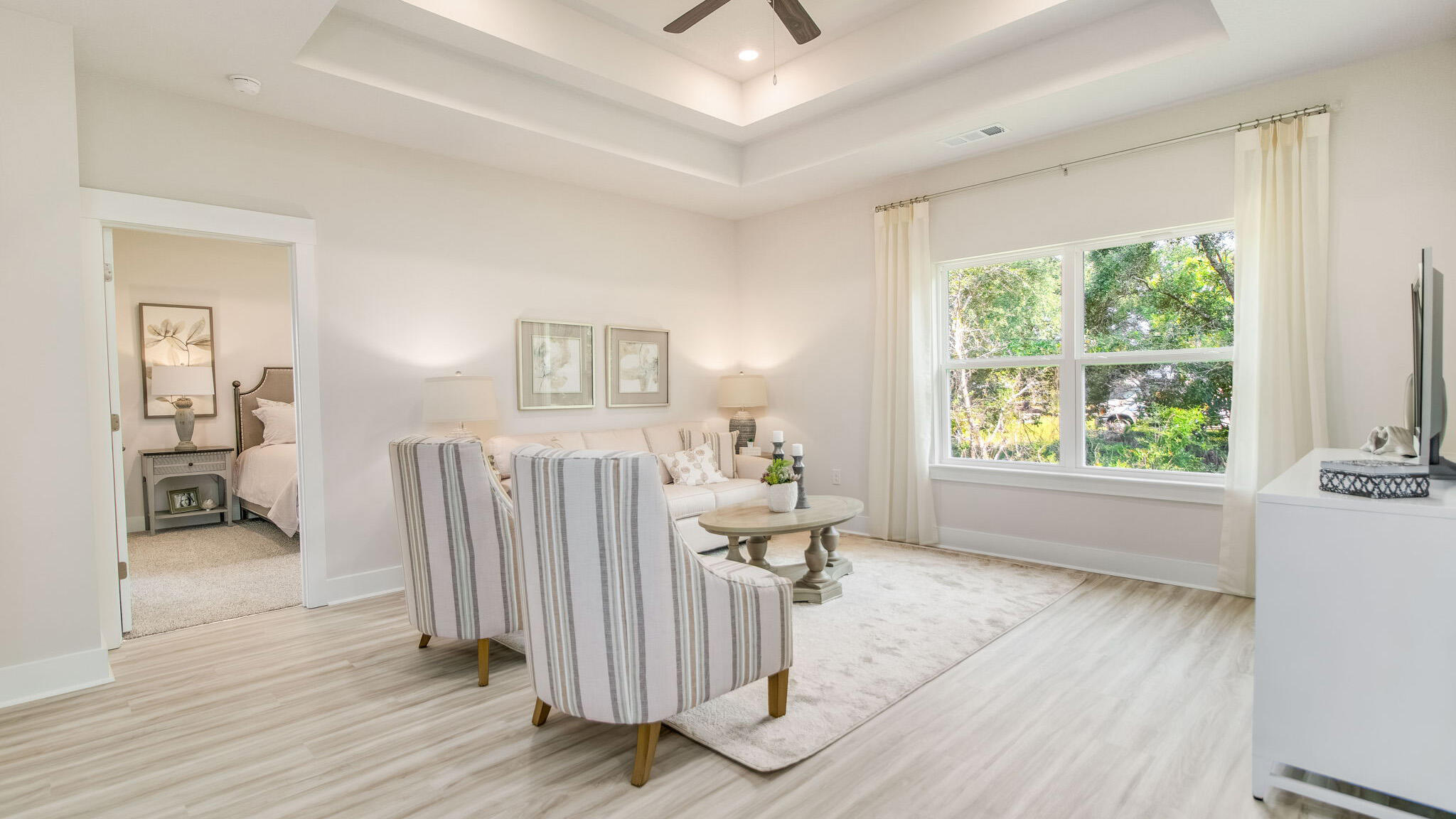 5841 Dove Nest Road Gulf Breeze, FL 32563 - Photo 12 of 30 a view of livingroom with furniture and wooden floor