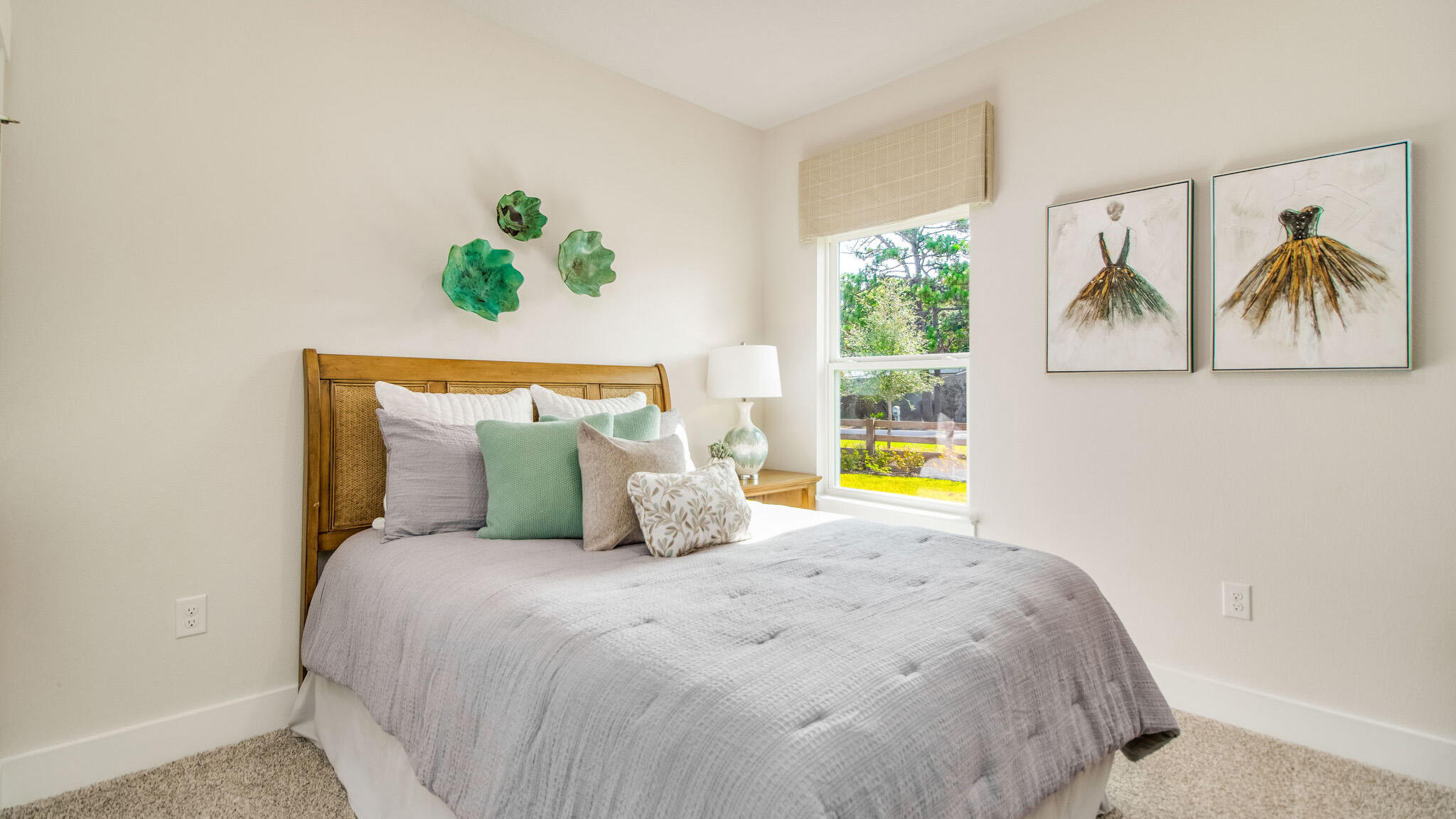 5841 Dove Nest Road Gulf Breeze, FL 32563 - Photo 28 of 30 a bedroom with a bed and a painting on the wall