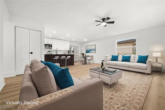 a living room with furniture and a couch