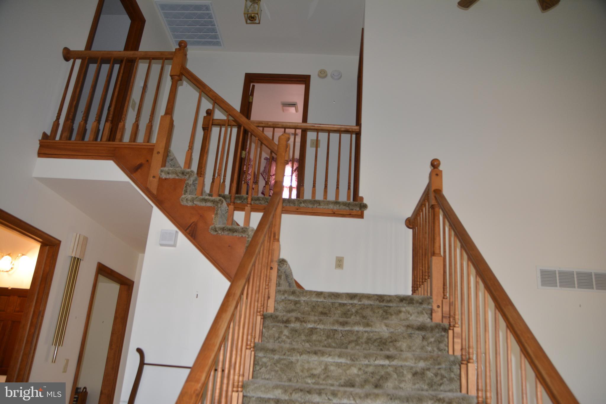 32612 Pine Grove Road Laurel, DE 19956 - Photo 22 of 45 first floor stair case to second floor