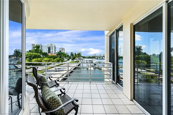 a view of balcony with chairs