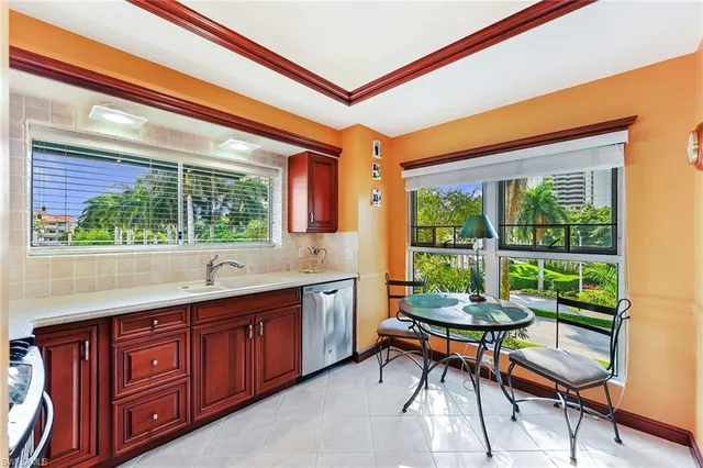 a reading room with furniture and a window