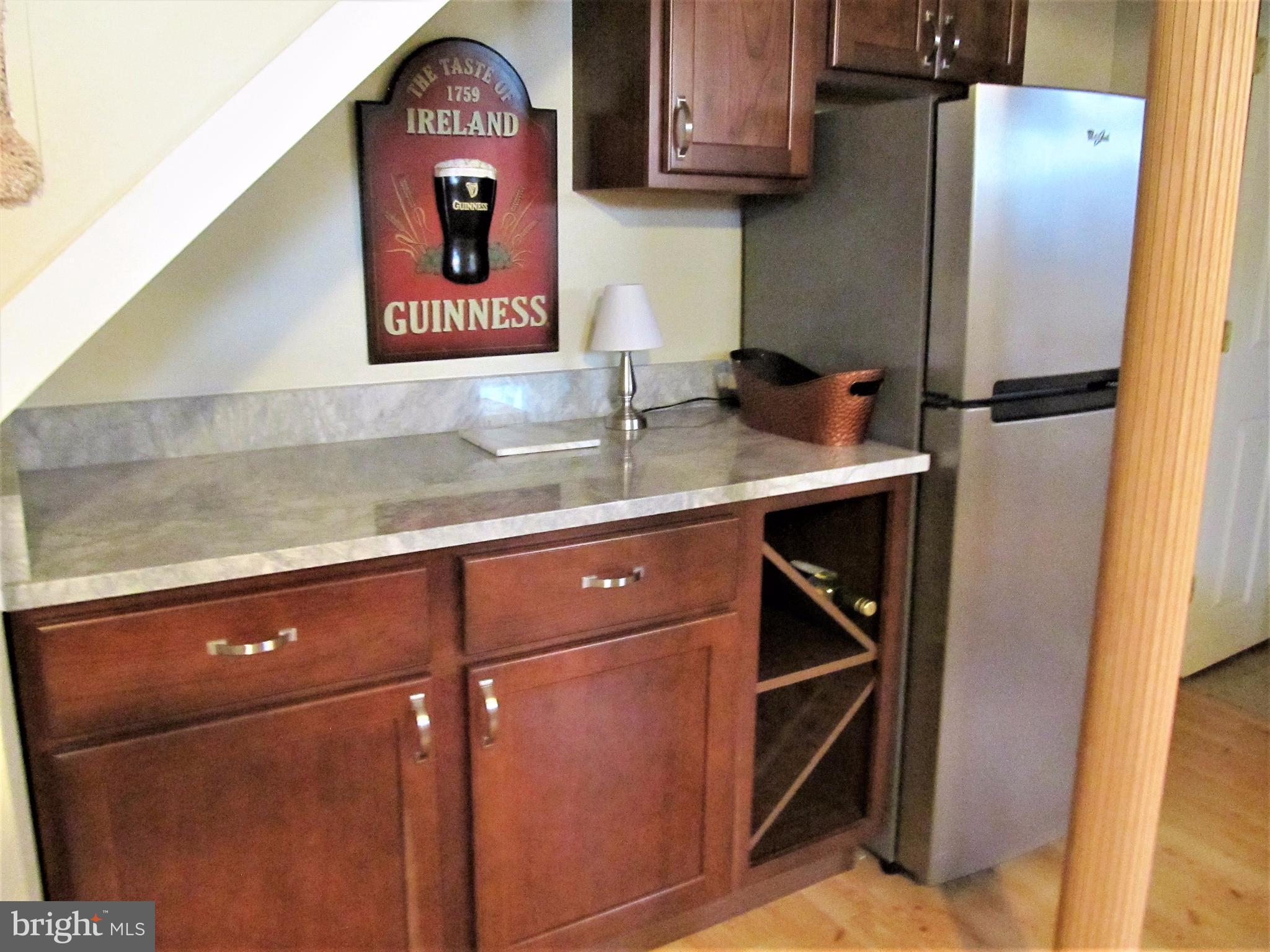 558 Fairmount Road Linthicum Heights, MD 21090 - Photo 18 of 30 a kitchen with stainless steel appliances granite countertop a refrigerator and a sink
