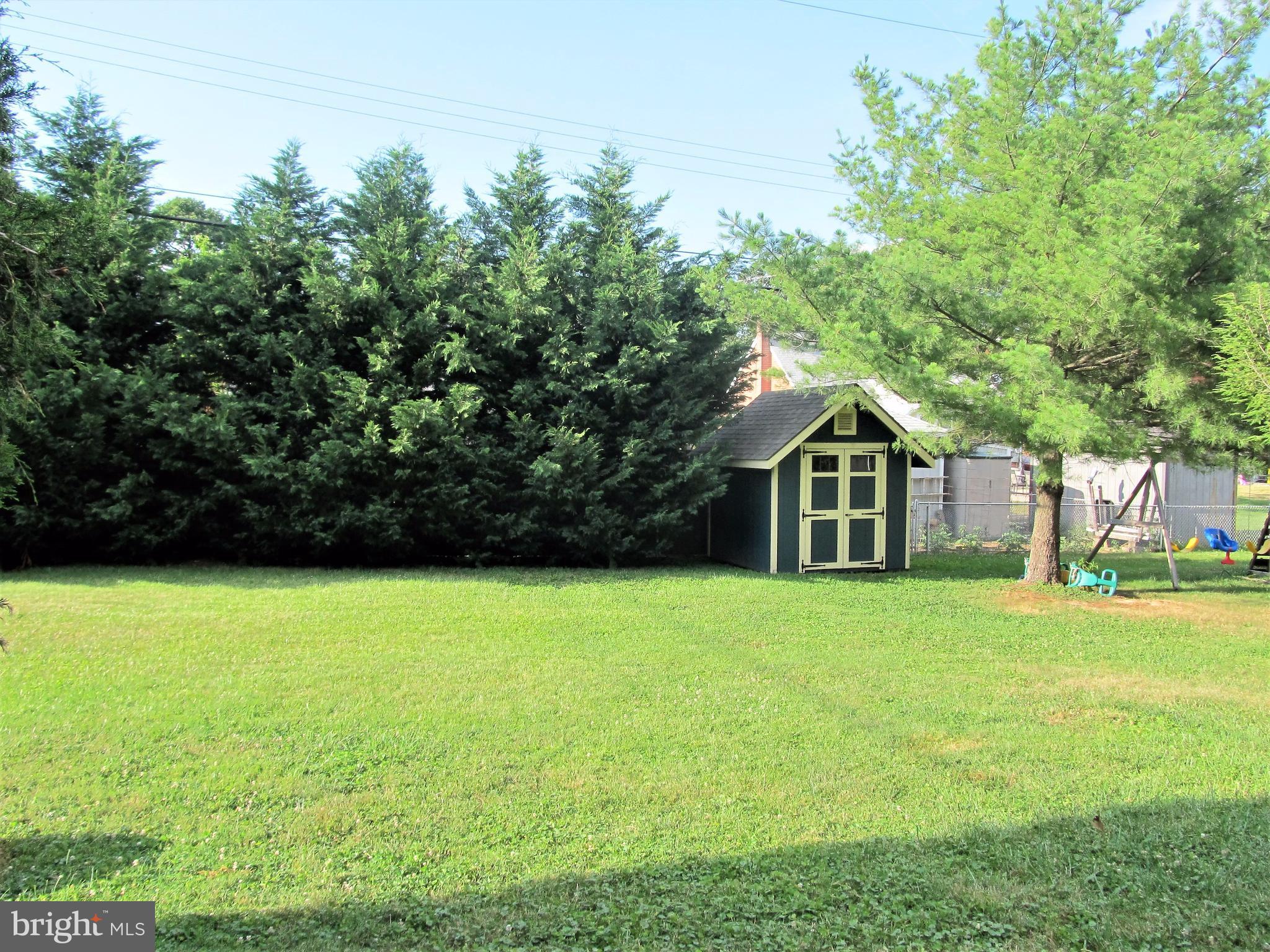 558 Fairmount Road Linthicum Heights, MD 21090 - Photo 25 of 30 a front view of a house with a garden