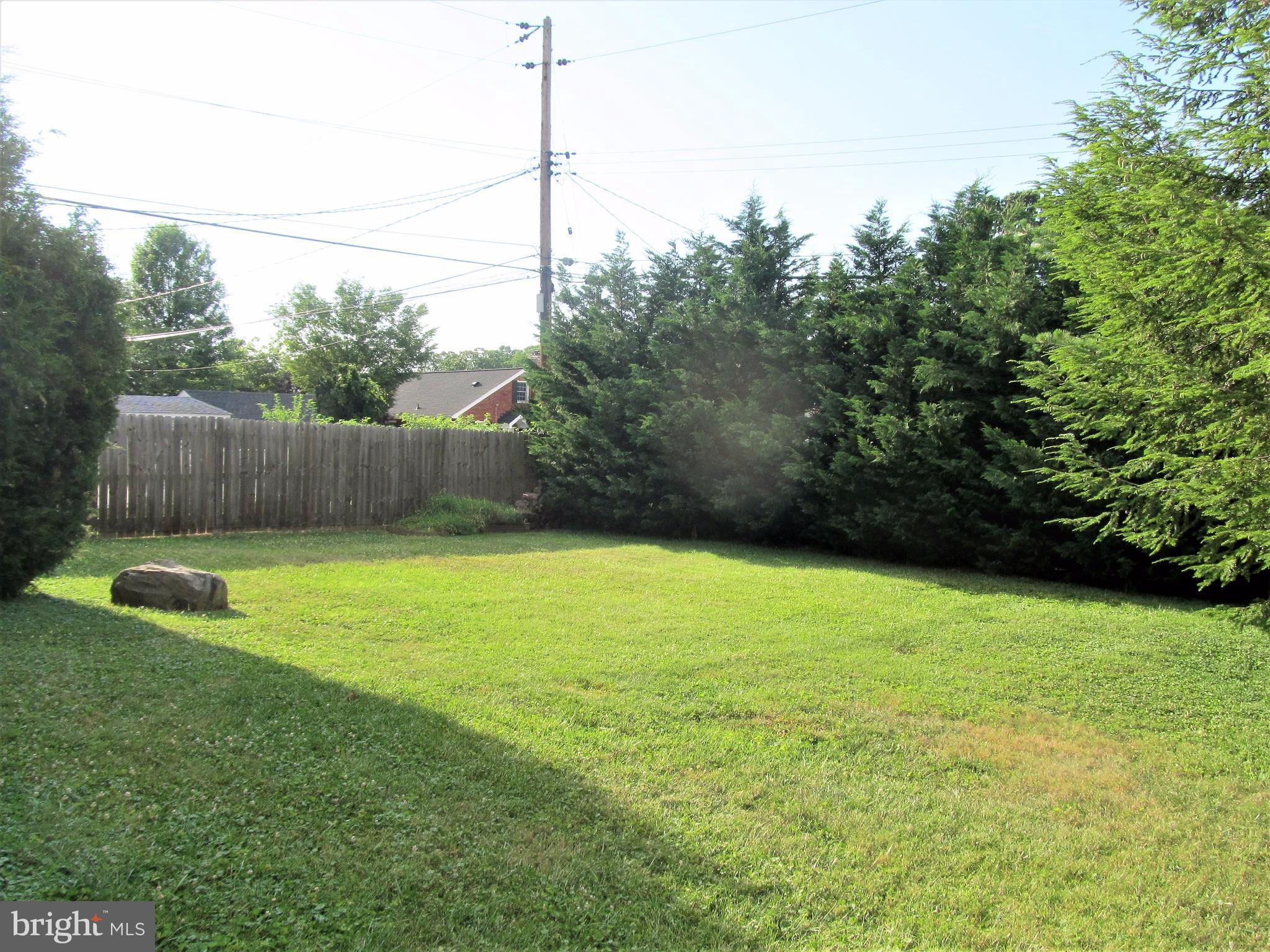 558 Fairmount Road Linthicum Heights, MD 21090 - Photo 26 of 30 a view of a backyard with a small cabin