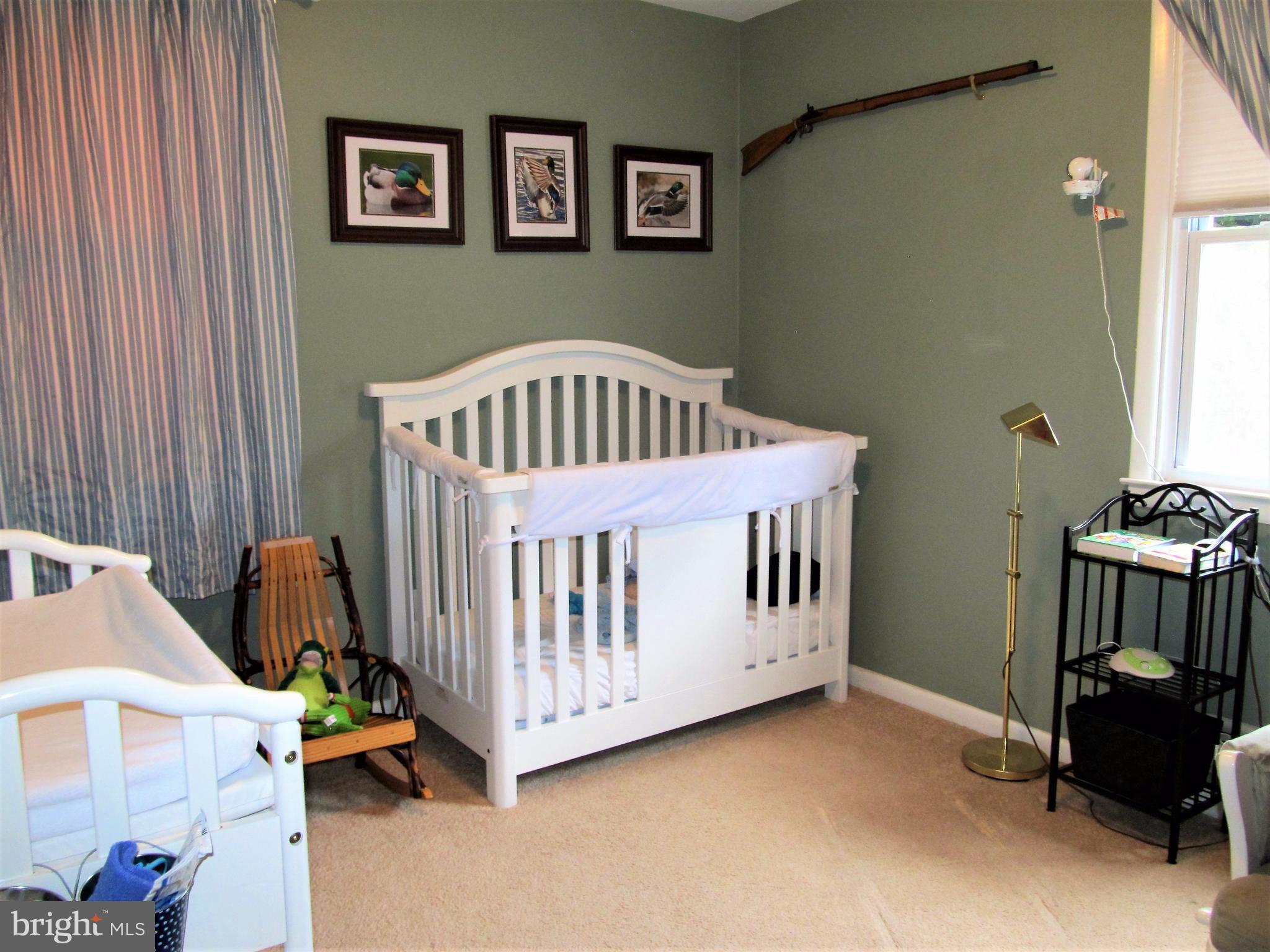 558 Fairmount Road Linthicum Heights, MD 21090 - Photo 10 of 30 a bedroom with a bed and furniture