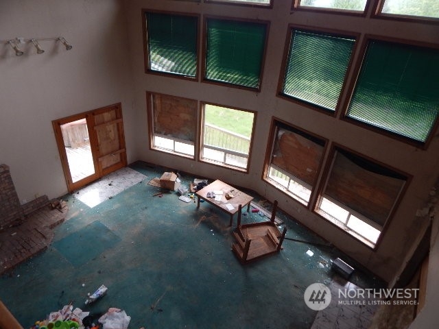 19312 Skinner Road Granite Falls, WA 98252 - Photo 11 of 23 a room with furniture and a window