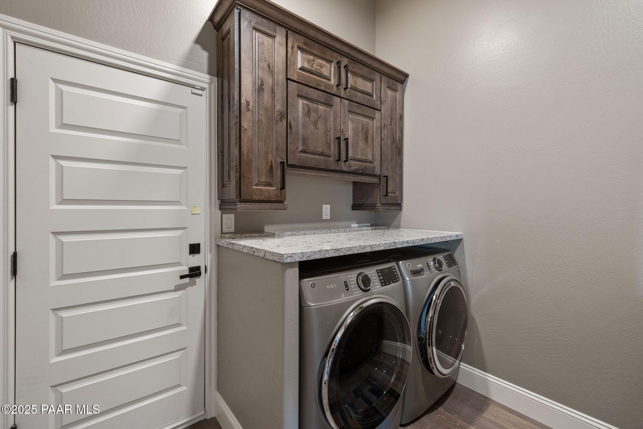 505 Miracle Rider Road Prescott, AZ 86301 - Photo 21 of 53 a utility room with washer and dryer
