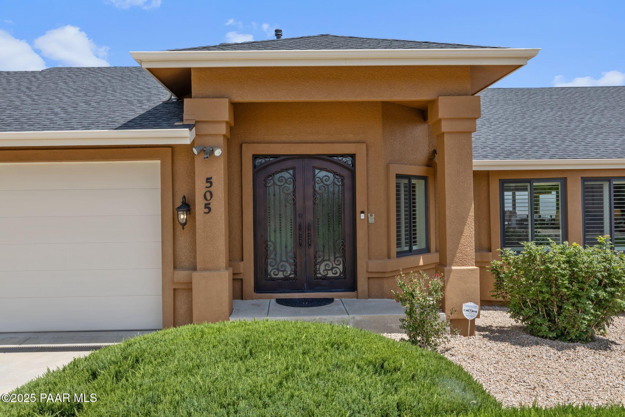 505 Miracle Rider Road Prescott, AZ 86301 - Photo 3 of 53 front view of a house with a yard
