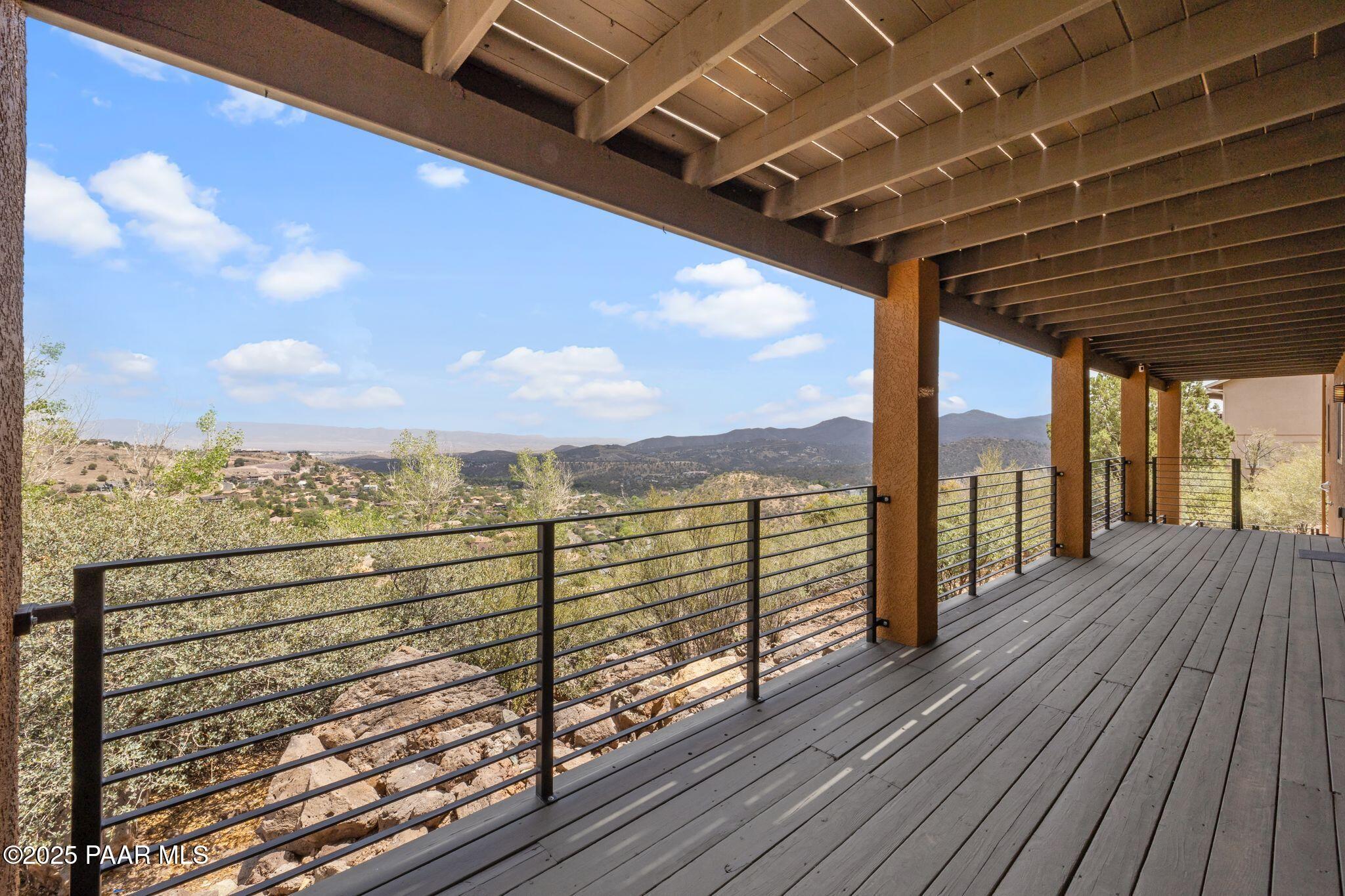 505 Miracle Rider Road Prescott, AZ 86301 - Photo 39 of 53 a view of a balcony with wooden floor