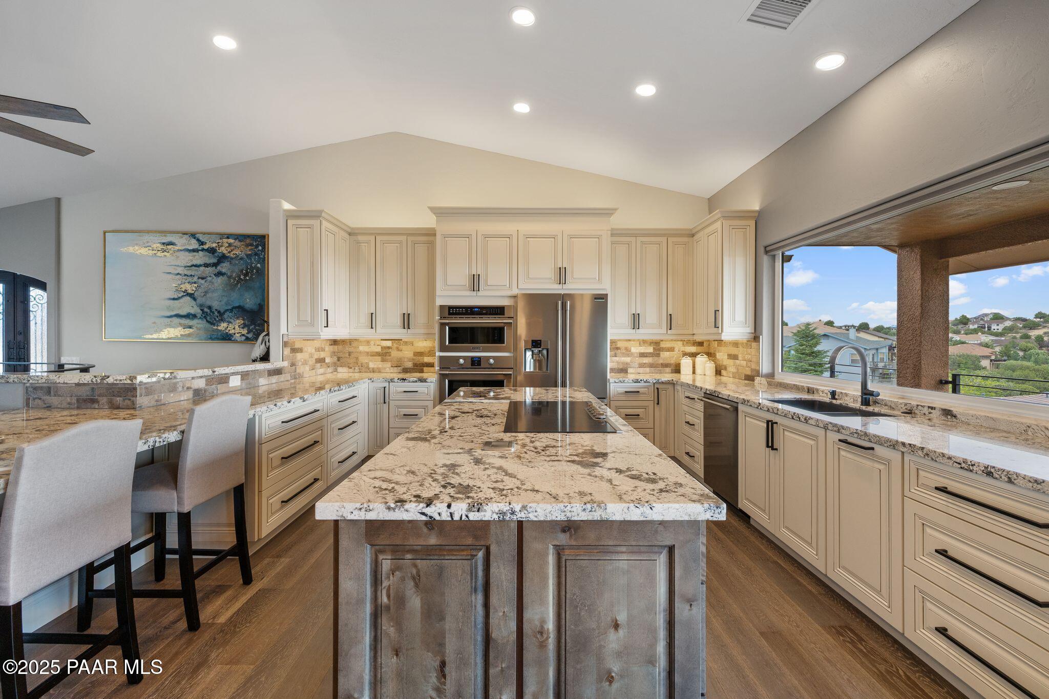505 Miracle Rider Road Prescott, AZ 86301 - Photo 9 of 53 a large kitchen with lots of counter space and window