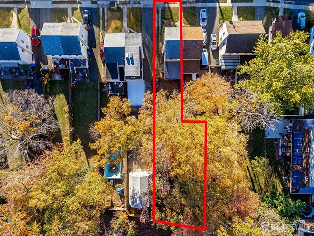 a living room with furniture and a ceiling fan