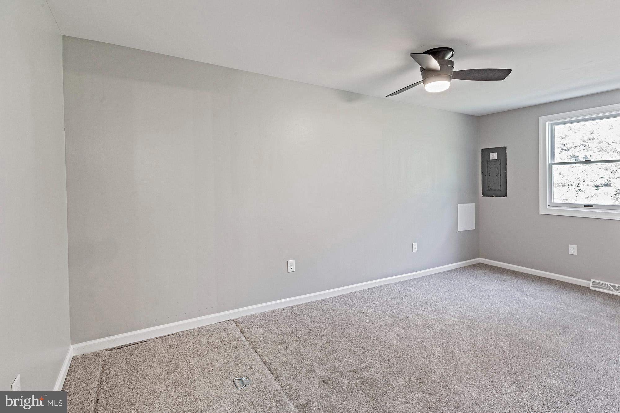 78 North Hook Road Pennsville, NJ 08070 - Photo 18 of 26 a view of an empty room with a window